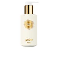 Bottle  of  Jean  Paul  Gaultier  Divine  Shower  Gel  by  Jean  Paul  Gaultier,  a  shower  gel  indicated  for  body  cleansing  and  fragrance.