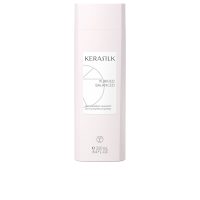 Bottle  of  Essentials  Anti-Dandruff  Shampoo  by  Kerasilk,  a  shampoo  indicated  for  removing  dandruff  and  rebalancing  oily  scalp.