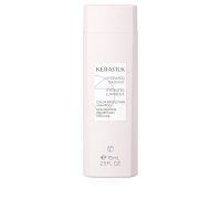 Bottle  of  Essentials  Color  Protecting  Shampoo  by  Kerasilk,  a  hydrating  shampoo  indicated  for  protecting  dyed  hair  color.