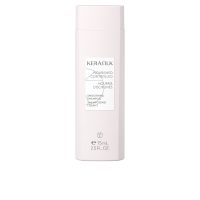 Bottle  of  Kerasilk  Essentials  Smoothing  Shampoo  by  Kerasilk,  a  shampoo  indicated  for  nourishing  and  soothing  frizzy  hair.