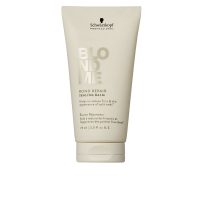 Tube  of  Schwarzkopf  Blondme  Bond  Repair  Sealing  Balm,  a  nourishing  balm  indicated  for  frizz  control  and  split  ends.