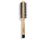 Product  container  of  Sisley  Hair  Rituel  The  Blow  Dry  Brush  Nº1,  a  round  hair  brush  indicated  for  straightening  and  shaping  hair.