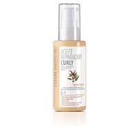 Bottle  of  Clearé  Institute  Curly  Curl  Definer  Repairing  Oil  by  Clearé  Institute,  an  oil  indicated  for  defining  curly  hair.
