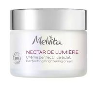 Jar  of  Melvita  Nectar  De  Lumière  Perfecting  Illuminating  Cream  by  Melvita,  a  day  cream  indicated  for  boosting  skin  radiance.