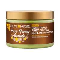Jar  of  Creme  Of  Nature  Pure  Honey  Avocado  Curl  Cream  by  Creme  Of  Nature,  a  curl  defining  cream  indicated  for  frizz-free  curls.