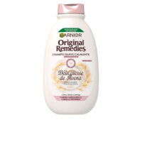 Bottle  of  Garnier  Original  Remedies  Oat  Delicatesse  Shampoo  by  Garnier,  a  gentle  shampoo  indicated  for  sensitive  scalp.
