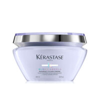 Jar  of  Kérastase  Blond  Absolu  Cicaextreme  Mask  by  Kérastase,  a  creamy  mask  indicated  for  restoring  bleached  blonde  hair.