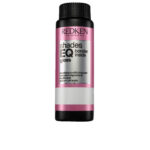 Box  of  Redken  Shades  EQ  Bonder  Inside  Color  07CB,  a  liquid  toner  indicated  for  strengthening  and  toning  sensitized  hair.