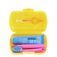 Box  of  Curaprox  Be  You  Yellow  Travel  Set  by  Curaprox,  an  oral  care  kit  indicated  for  thorough  and  deep  mouth  cleaning.