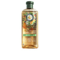 Bottle  of  Herbal  Essences  Volume  Orange  Shampoo  by  Herbal  Essences,  a  foaming  shampoo  indicated  for  adding  hair  volume.