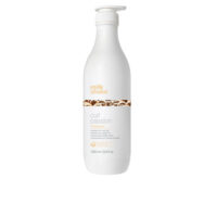 Bottle  of  Milk  Shake  Curl  Passion  Shampoo  by  Milk  Shake,  a  nourishing  shampoo  indicated  for  cleansing  and  hydrating  curly  hair.