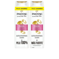 Bottle  of  Pantene  Defined  Curls  Shampoo  by  Pantene,  a  lightweight  shampoo  indicated  for  defining  and  nourishing  curly  hair.
