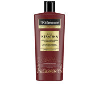 Bottle  of  Tresemmé  Smooth  Keratin  Shampoo  by  Tresemmé,  a  cream  shampoo  indicated  for  smoothing  and  frizz  control.