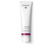 Bottle  of  Dr.  Hauschka  Conditioner  for  Shine  and  Softness,  a  silky  nourishing  conditioner  indicated  for  hair  shine  and  softness.