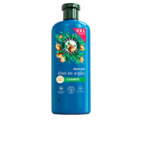 Bottle  of  Herbal  Essences  Argan  Oil  Repairing  Shampoo,  a  cleansing  shampoo  indicated  for  repairing  and  smoothing  damaged  hair.