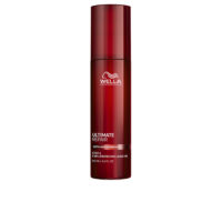 Bottle  of  Wella  Professionals  Ultimate  Repair  Protective  Leave-In  Serum  by  Wella,  a  cream  serum  for  damaged  hair  repair.