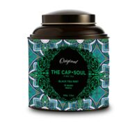 Product  container  of  The  Capsoul  Black  Tea  Mint  by  The  Capsoul,  a  loose-leaf  tea  indicated  for  an  invigorating  and  hydrating  experience.