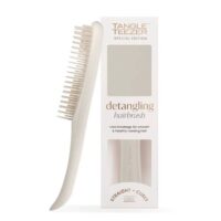 Product  container  of  Tangle  Teezer  Wet  Detangler  Brush  Matte  Pumice  Gray  by  Tangle  Teezer,  a  hairbrush  indicated  for  removing  knots.